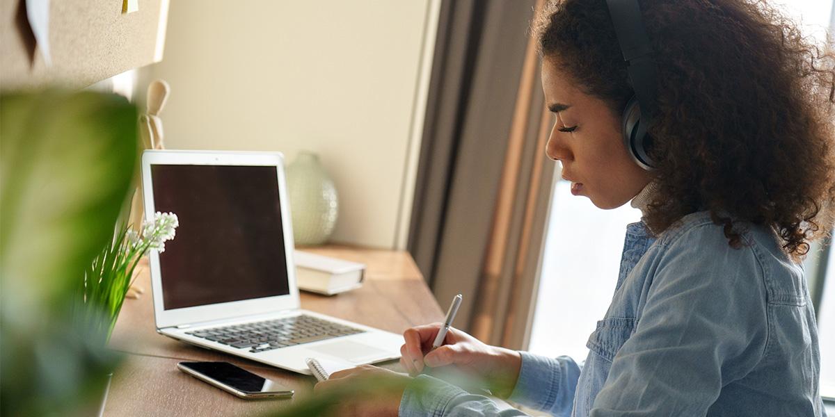 Student studying using a laptop.